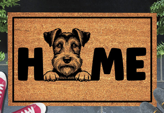 Fox Terrier coir doormat with home text displayed in doorway entryway
