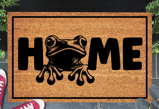Frog doormat #1 with home text placed at front door entryway