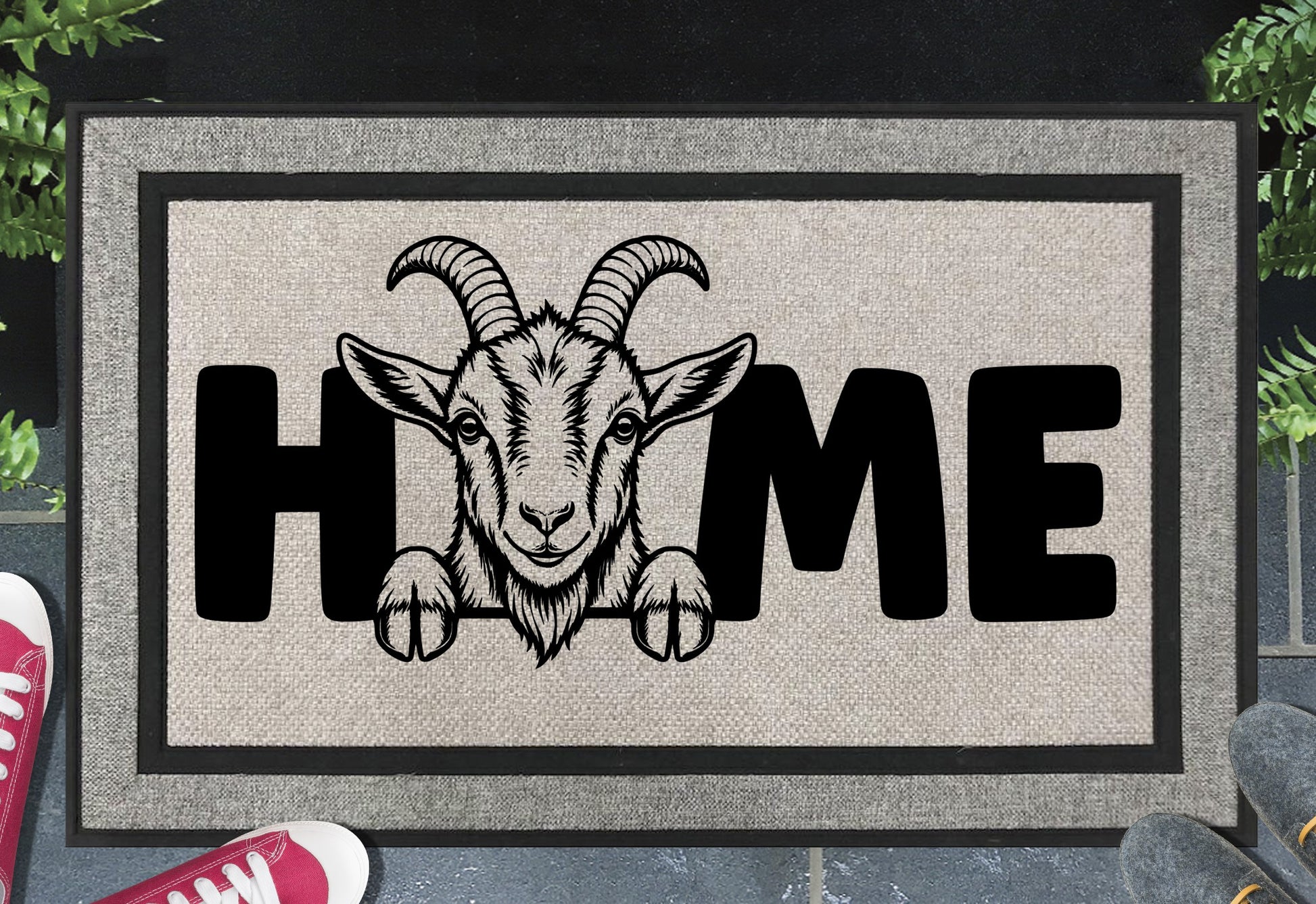 Goat doormat #1 with HOME text placed at front door entryway