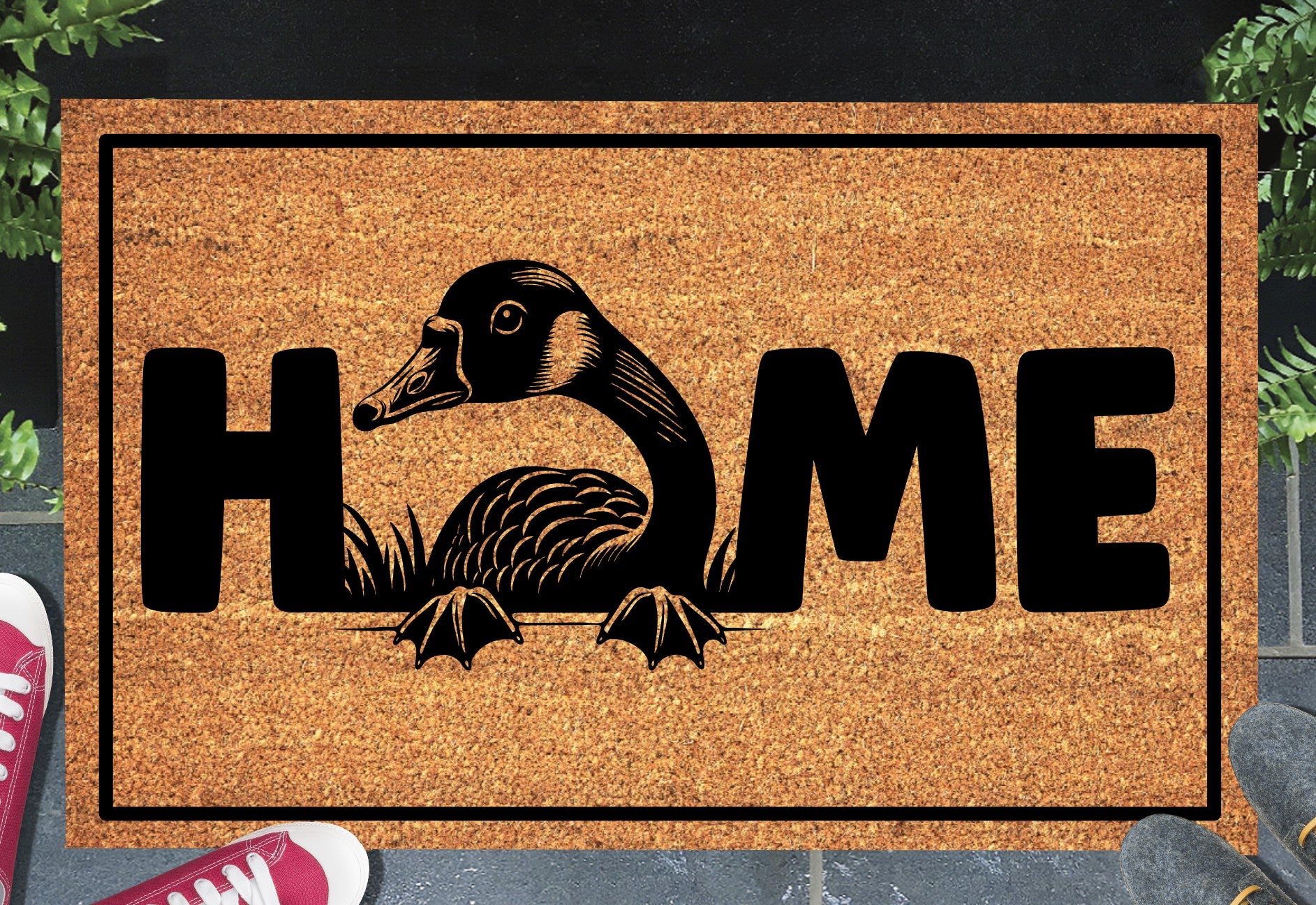 Goose doormat #1 with home text placed at front door entryway