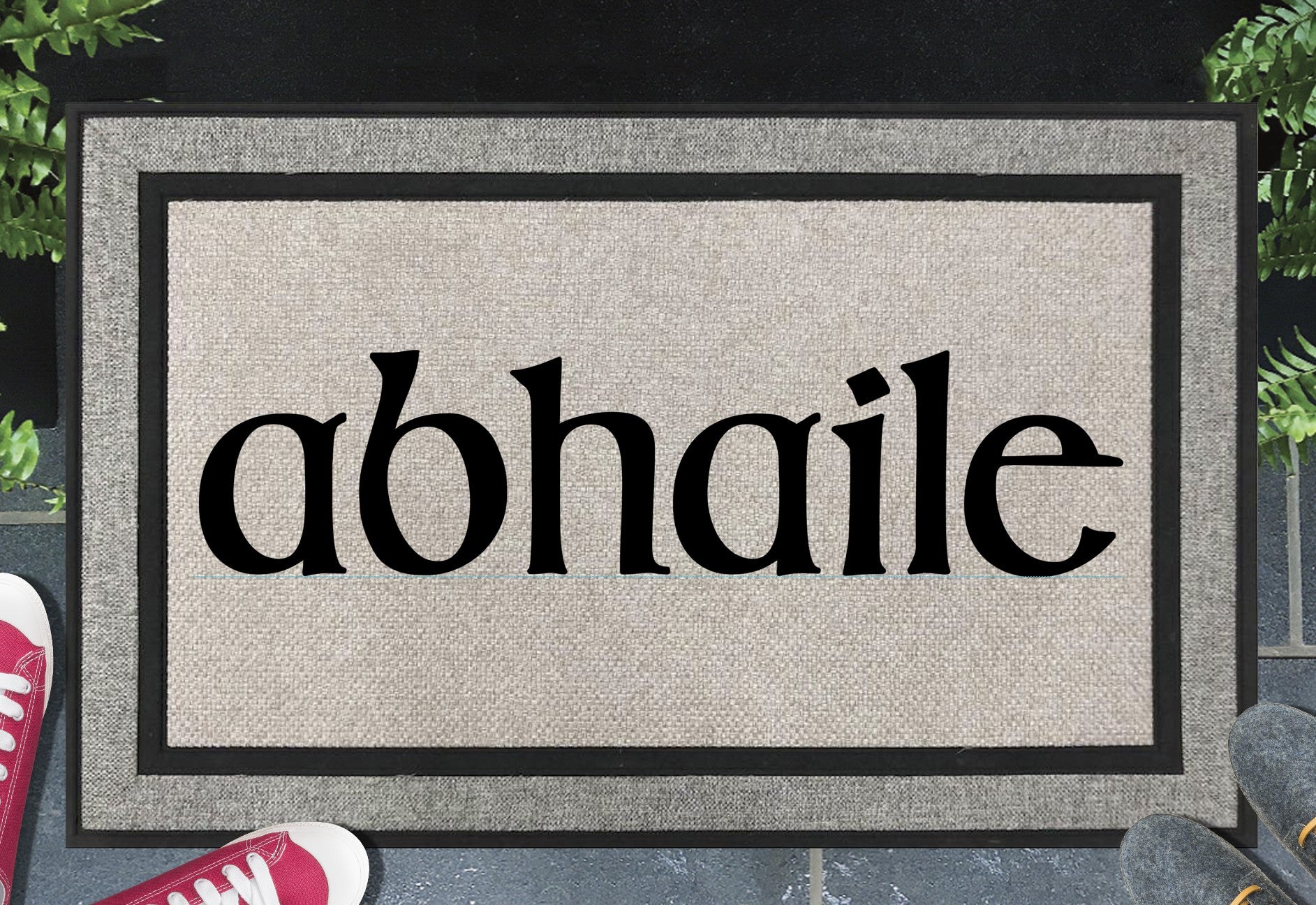 Abhaile Irish welcome all-weather doormat placed at front door entrance