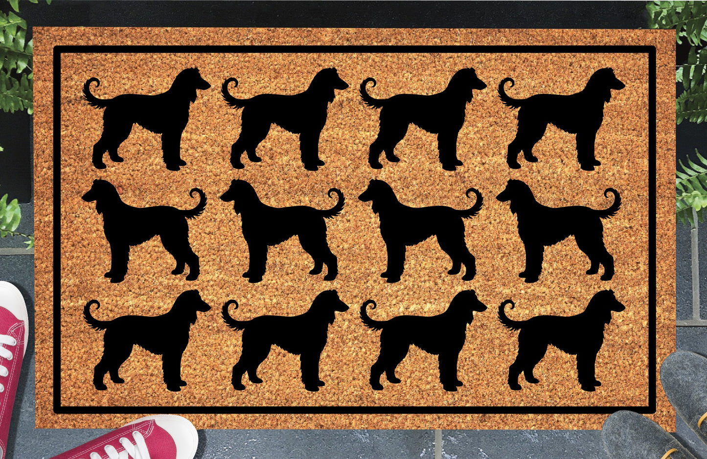 Afghan Hound Parade coir doormat in a doorway setting — rows of Affie silhouettes in a repeating pattern on a natural coir mat with black border.
