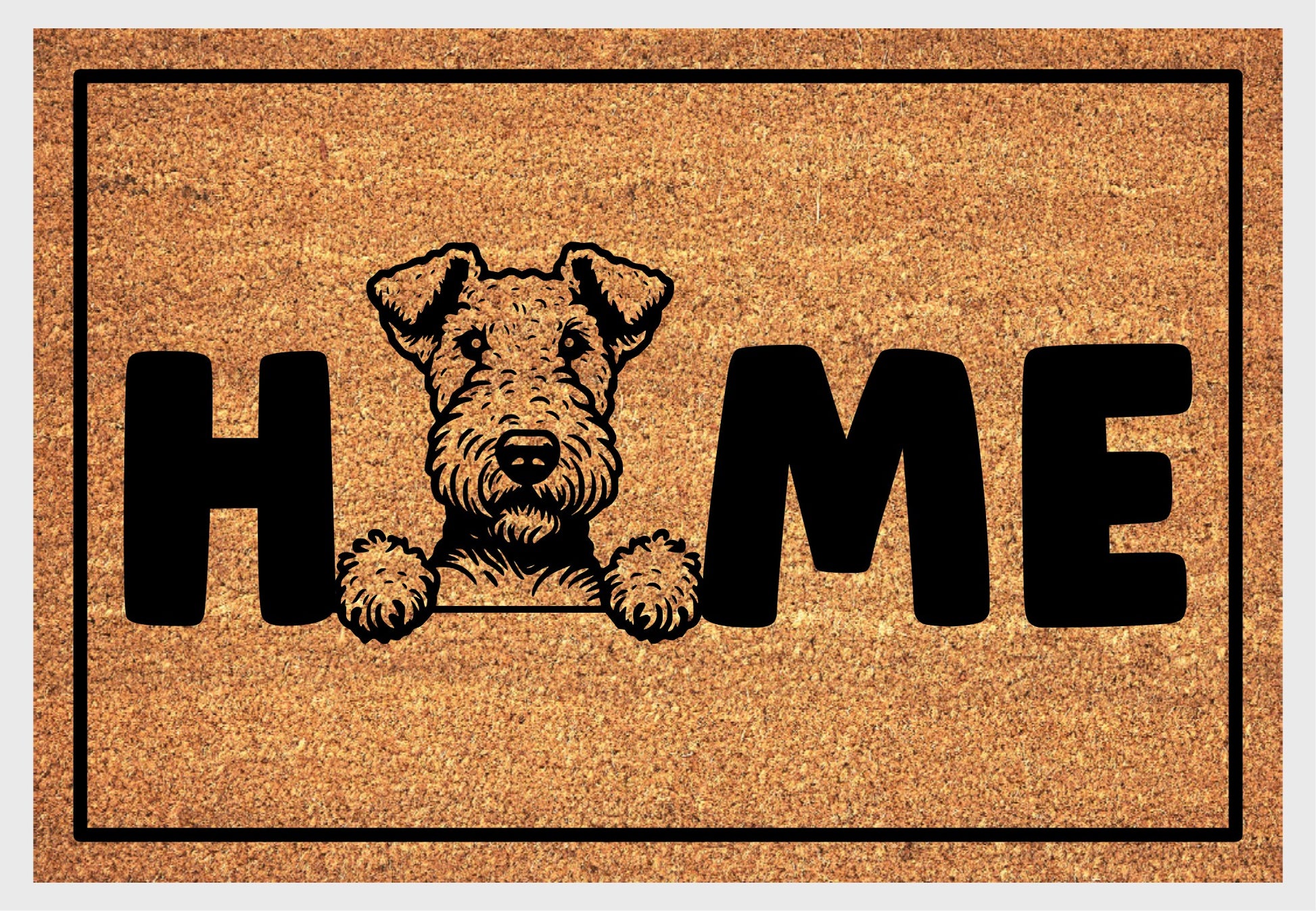 Airedale Terrier coir doormat with portrait illustration of an Airedale Terrier replacing the letter O in bold black HOME lettering, on a natural golden coir surface with black border, plain white background