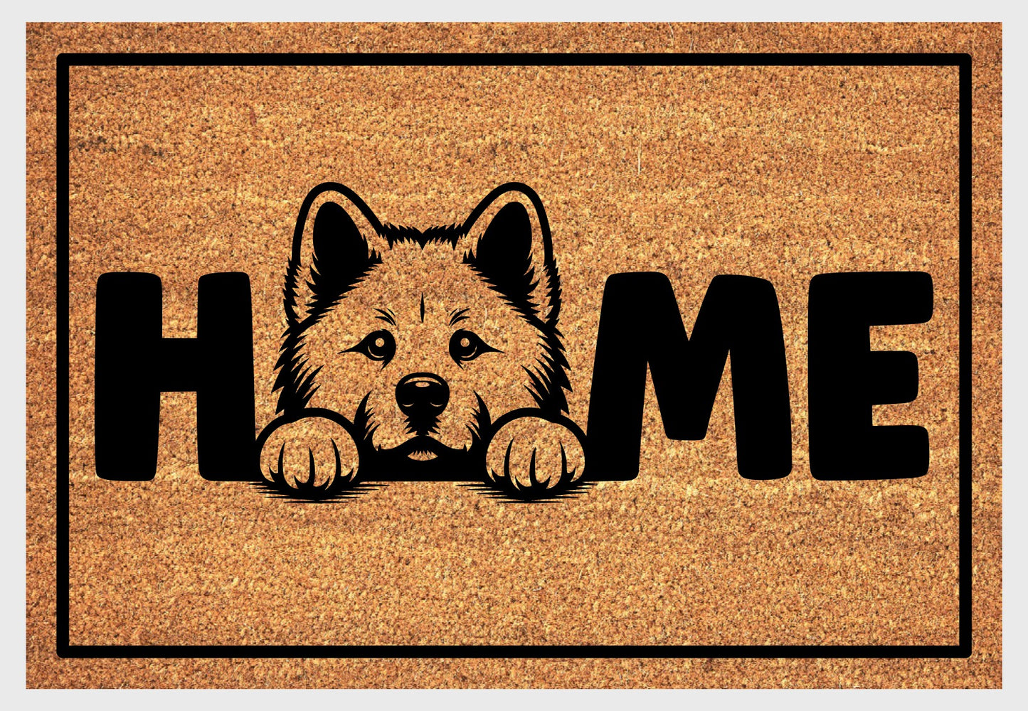 Akita coir doormat with portrait illustration of an Akita replacing the letter O in bold black HOME lettering, on a natural golden coir surface with black border, plain white background