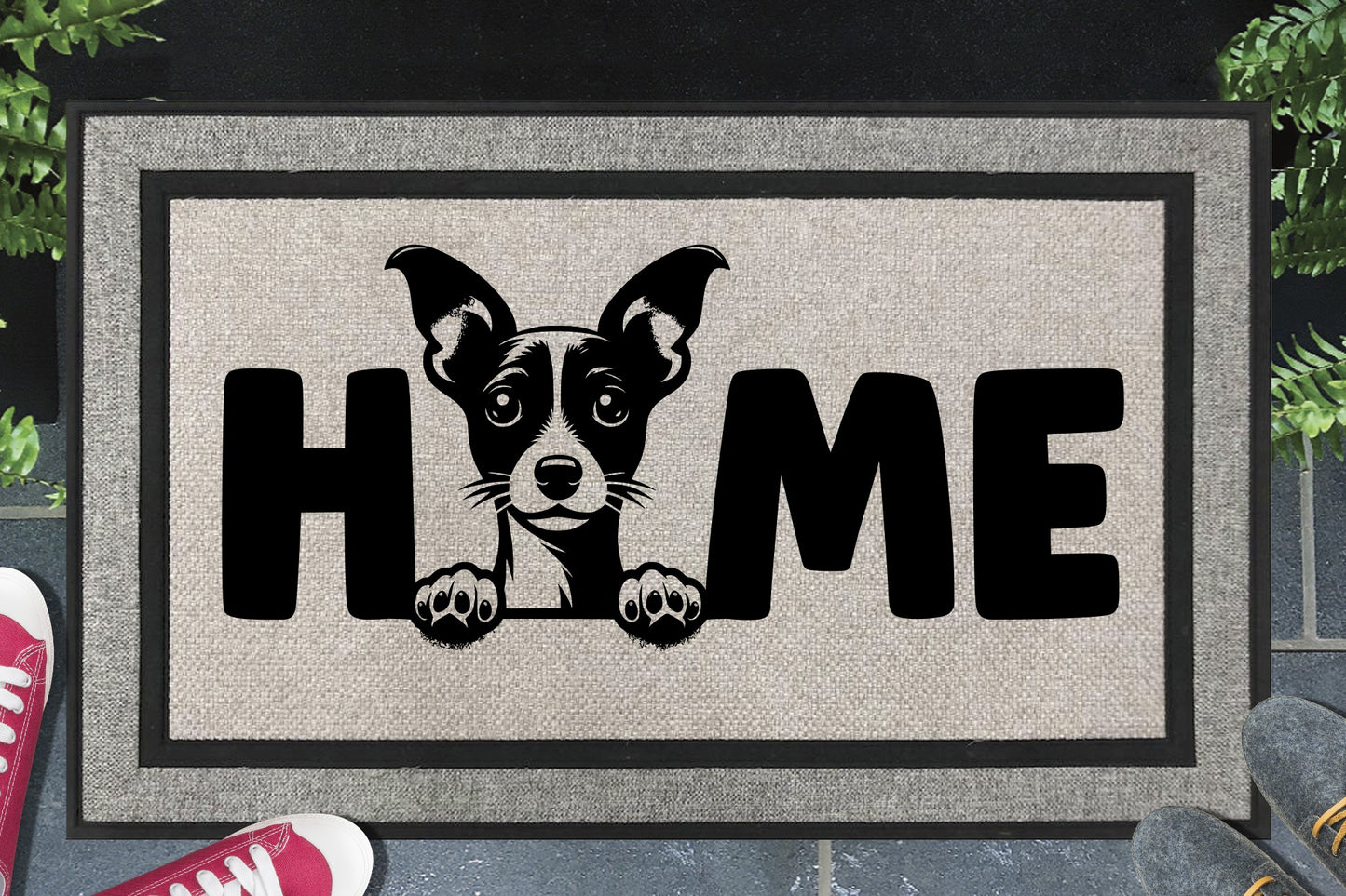 Toy Fox Terrier coir doormat with home text displayed in doorway entryway