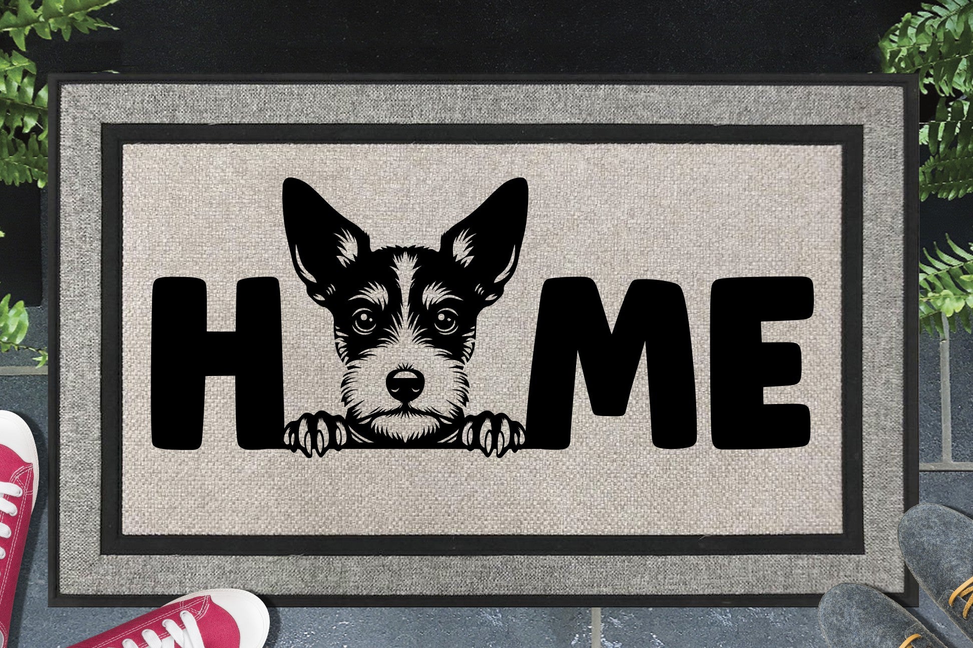 Toy Fox Terrier all weather doormat with home text displayed in doorway entryway
