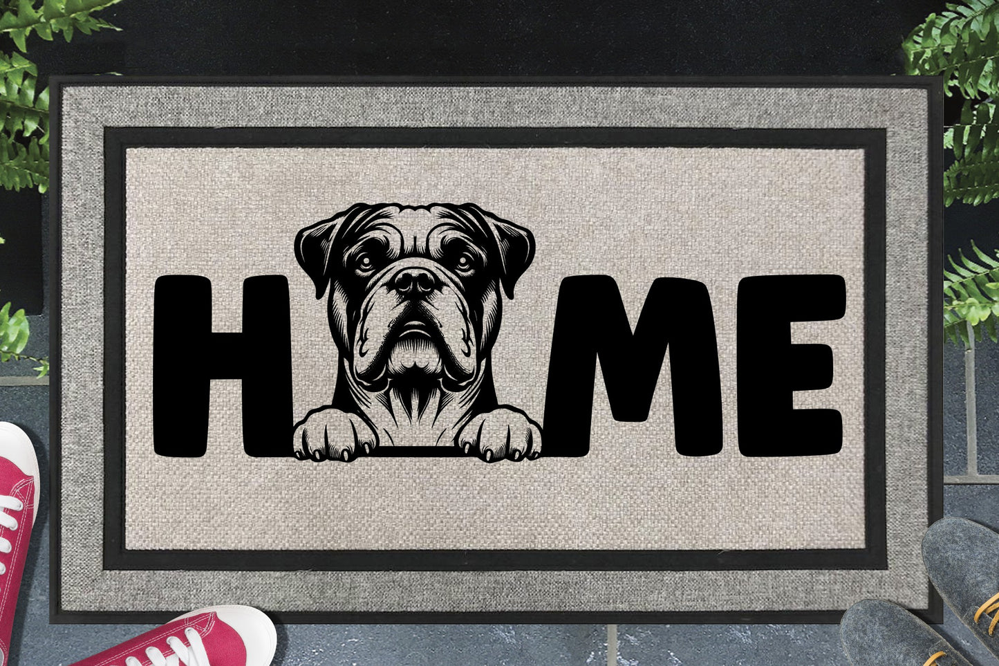 American Bulldog HOME all-weather doormat in doorway lifestyle shot — light grey linen-look woven polyester mat, deep-muzzled American Bulldog head and paws illustration replaces the letter O in HOME, 18x30 size shown