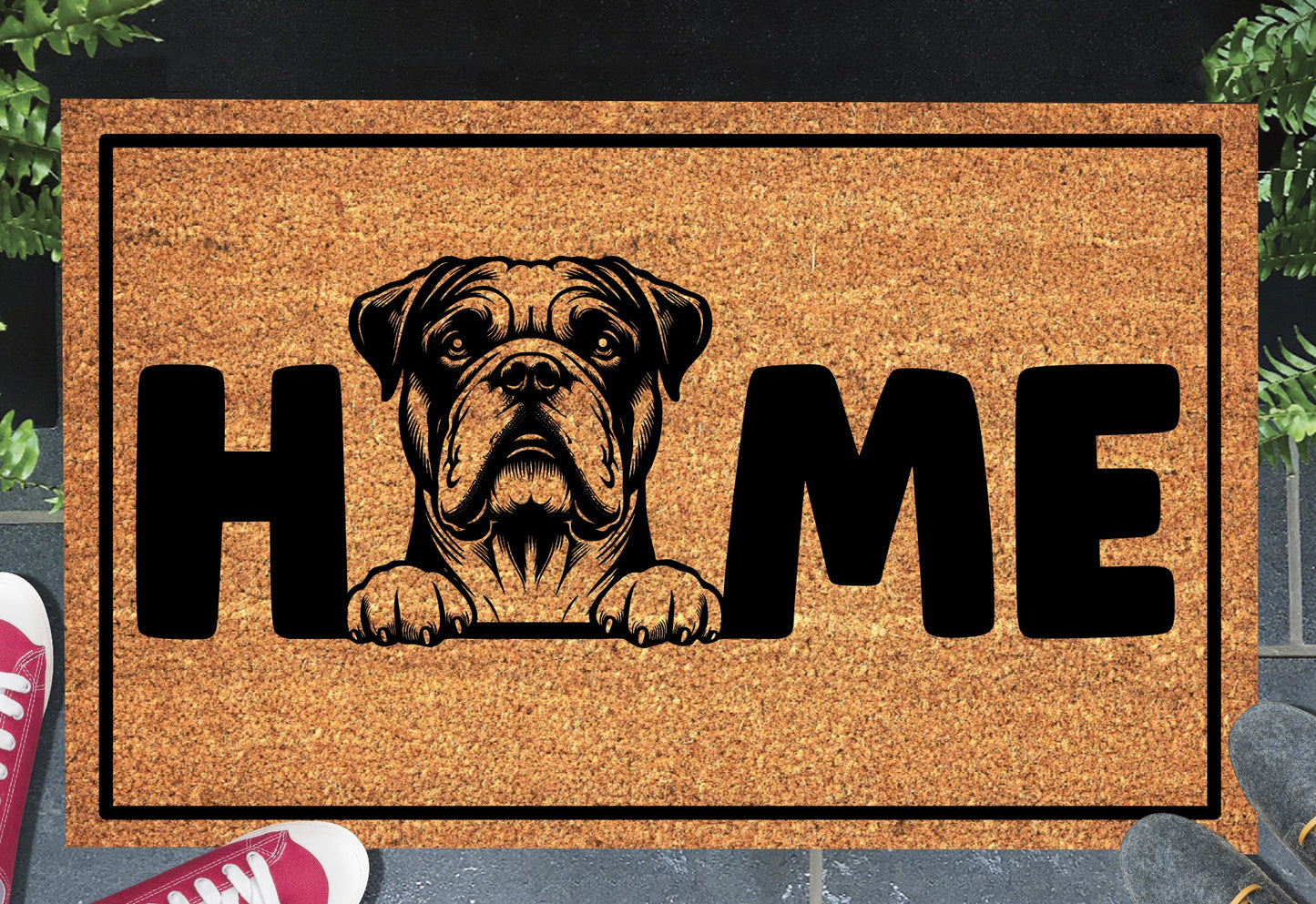 American Bulldog HOME doormat in doorway lifestyle shot — natural tan coir mat, American Bulldog head and paws illustration replaces the letter O in HOME