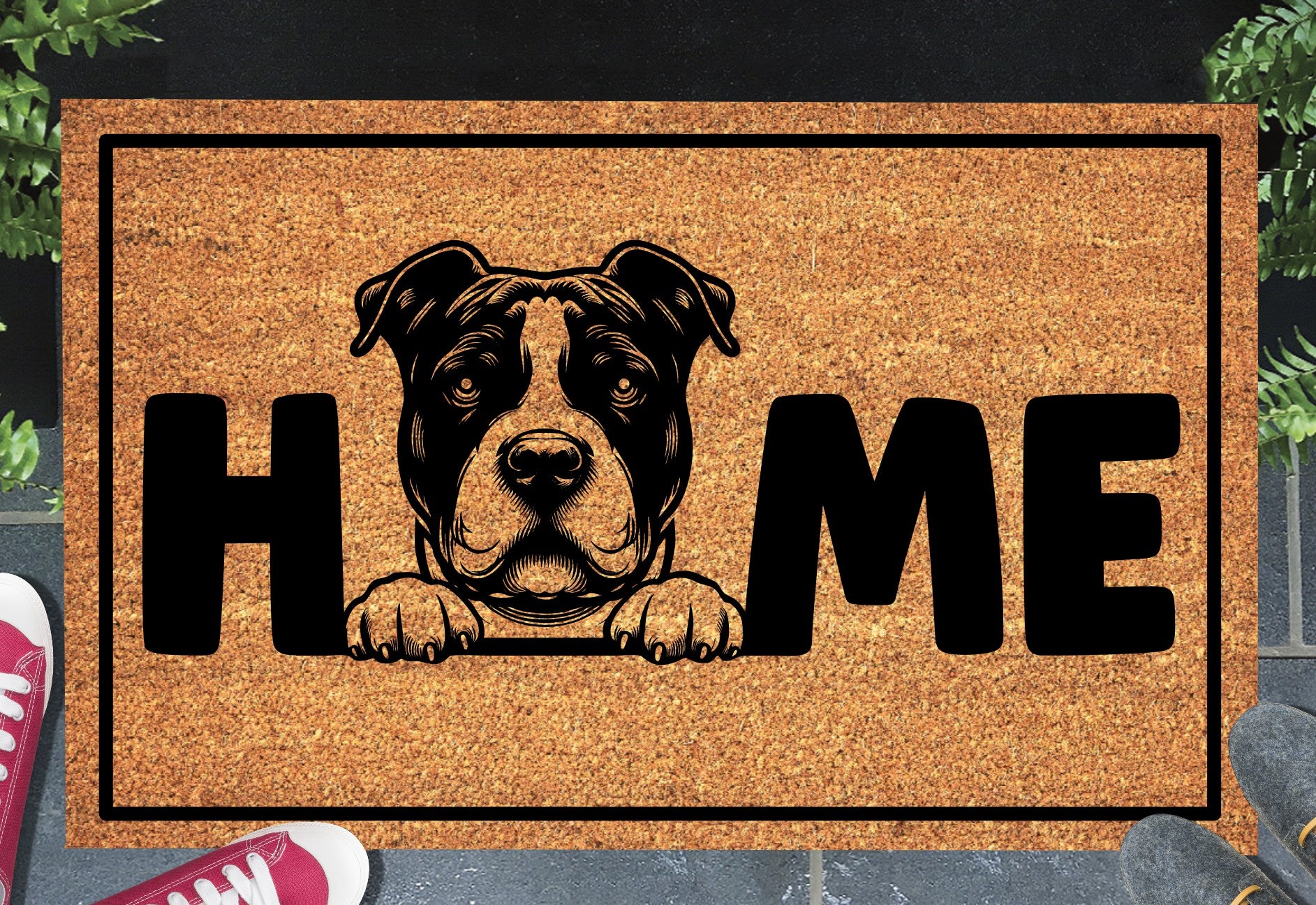 American Bully coir doormat in a doorway — Bully illustration replacing the letter O in "HOME" on natural coir, front door entryway