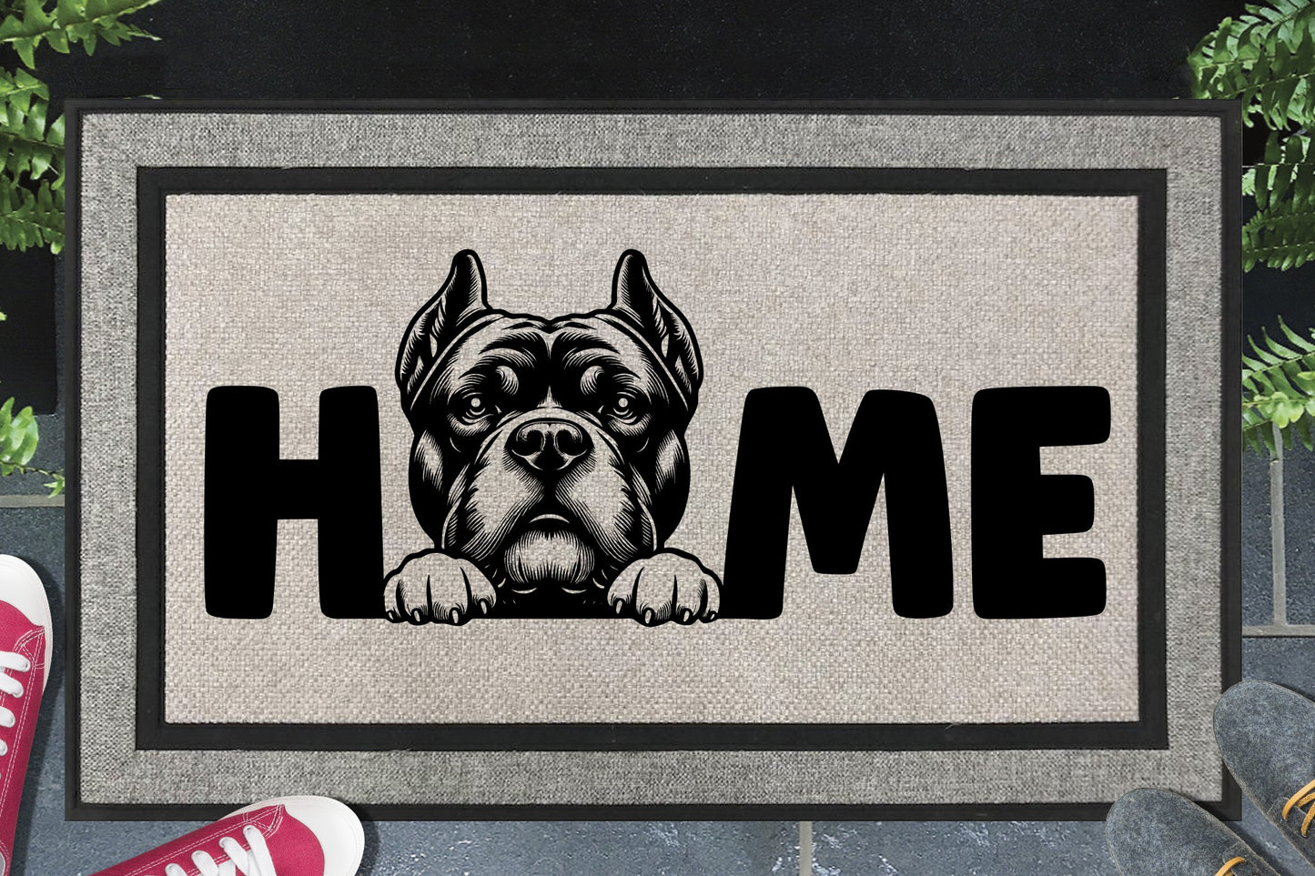 American Bully all-weather doormat in a doorway — Bully illustration replacing the letter O in "HOME", UV-cured inks on woven polyester, front door entryway