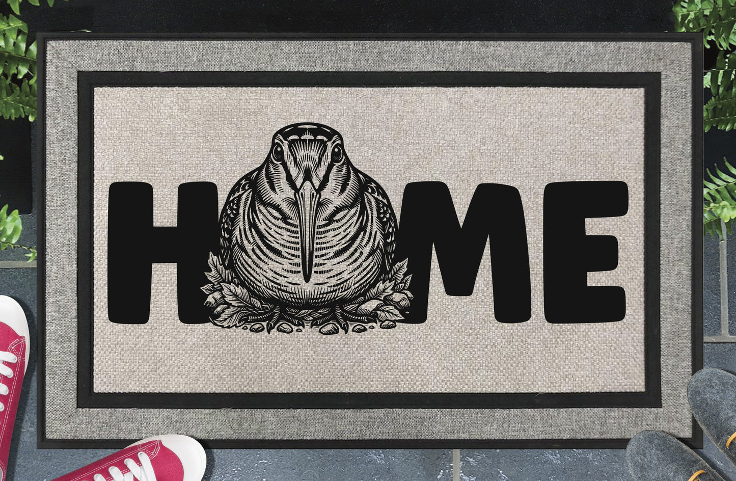 American Woodcock all-weather doormat — detailed Timberdoodle head portrait with extended bill replaces the letter O in HOME, woven polyester with linen look finish
