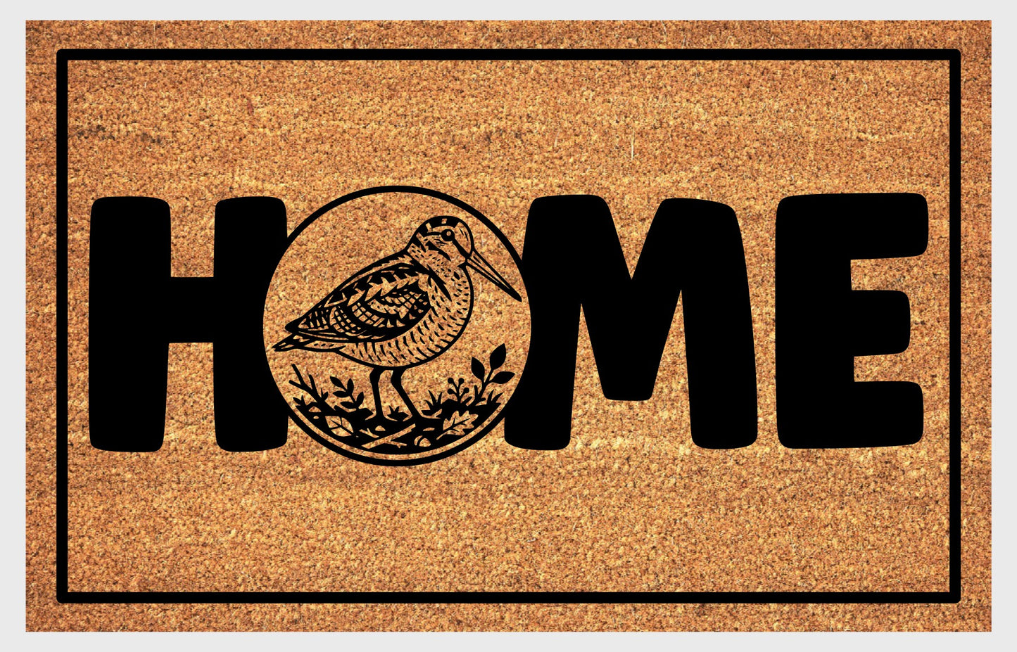 American Woodcock coir doormat — Bogsucker full-body illustration in circular botanical frame replaces the letter O in HOME, natural coir fiber