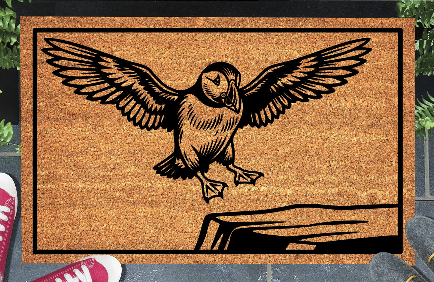 Atlantic Puffin coir doormat in a doorway — scenic illustration of Puffin coming in to land, wings raised, on a clifftop ledge, on natural coir