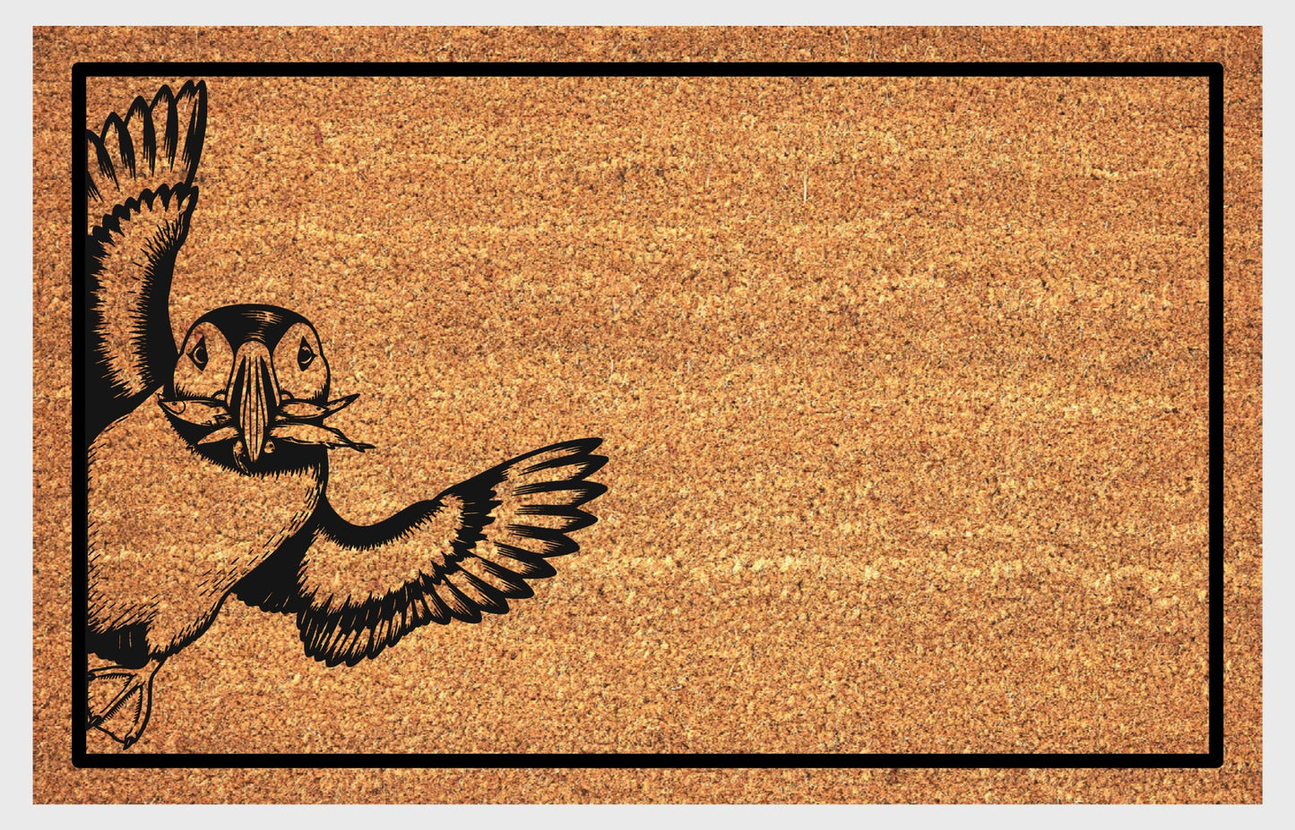 Atlantic Puffin coir doormat flat lay — scenic illustration of Atlantic Puffin in flight, wings spread wide, on natural coir