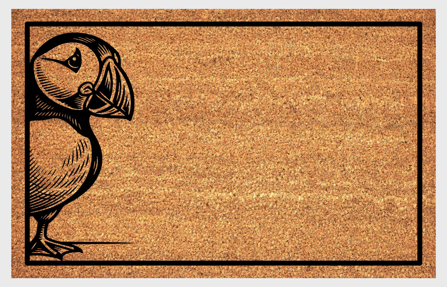 Puffin welcome mat at front door — Penguin of the North standing pose design on natural coir