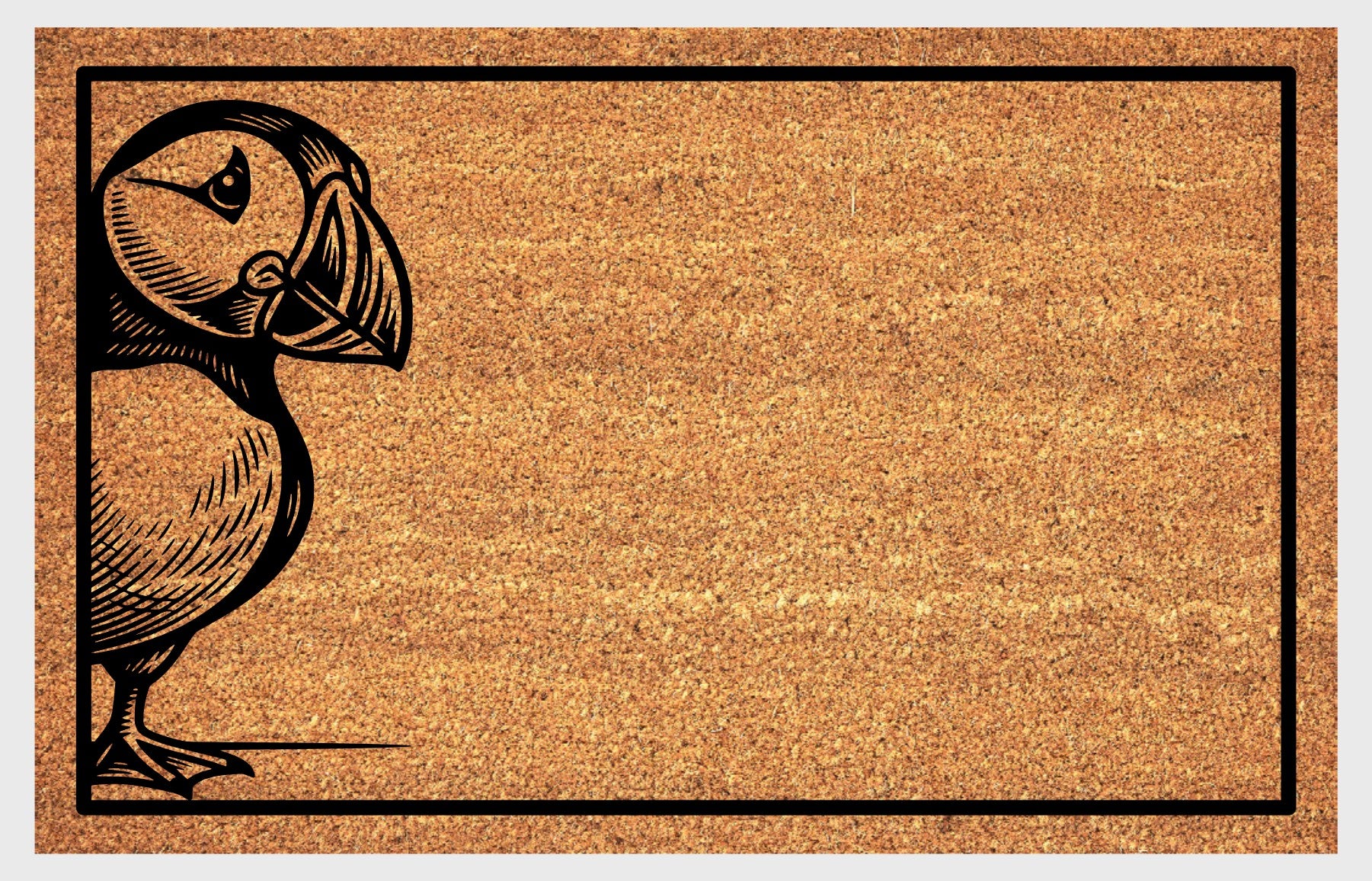 Puffin welcome mat at front door — Penguin of the North standing pose design on natural coir