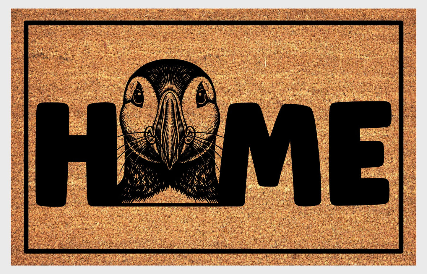 Atlantic Puffin coir doormat flat lay — Puffin illustration replacing the letter O in "HOME" on natural coir