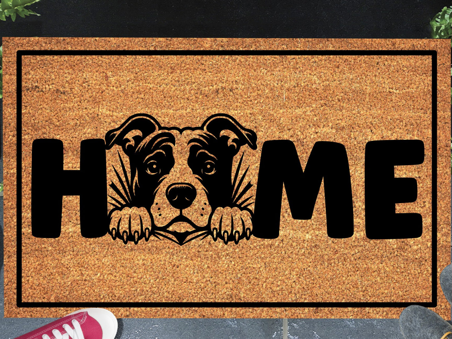 American Pit Bull Terrier coir doormat in a doorway — Pittie illustration replacing the letter O in "HOME" on natural coir, front door entryway