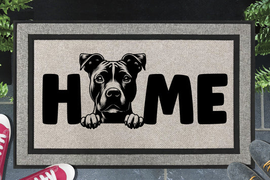 American Pit Bull Terrier doormat — Velvet Hippo Pittie illustration replaces the letter O in HOME on a woven polyester all-weather welcome mat