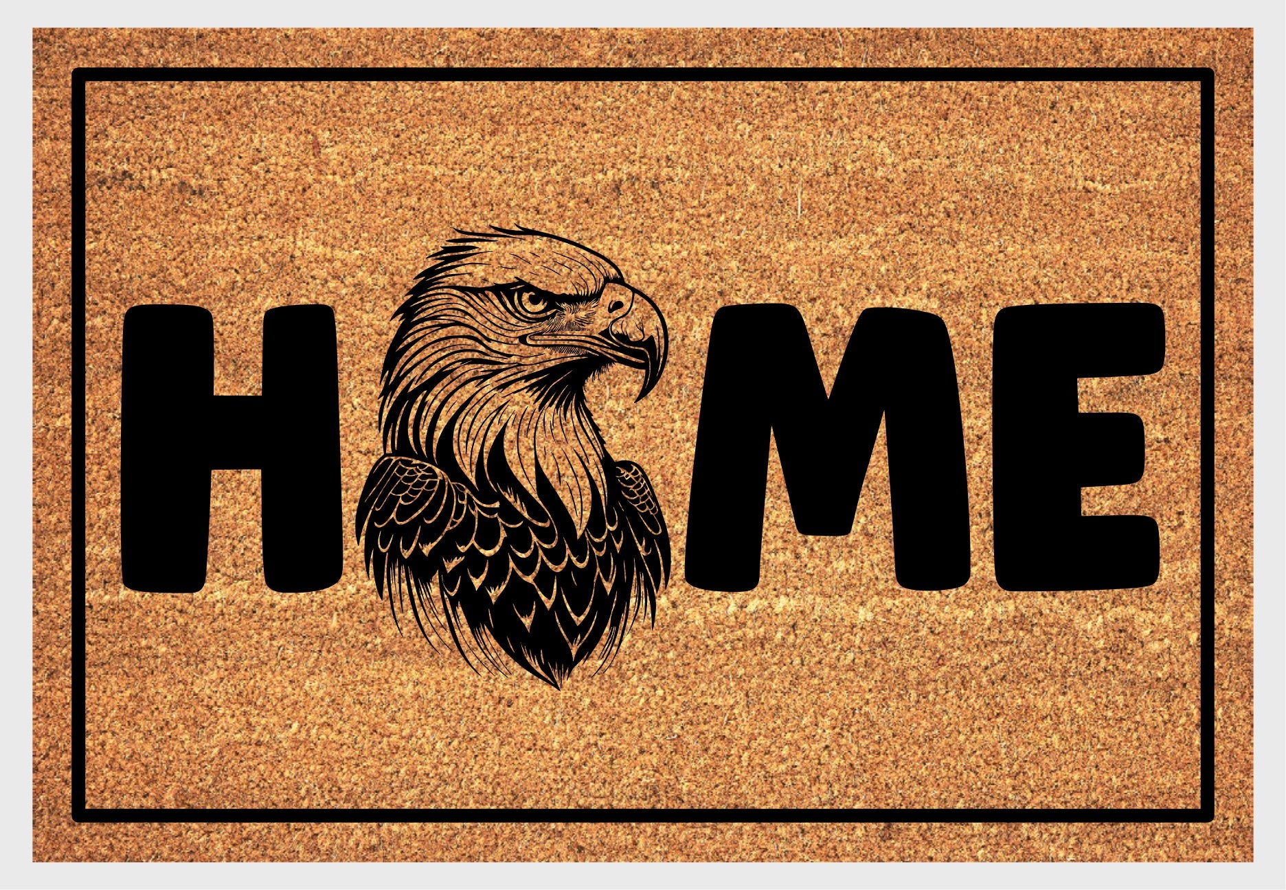 American Bald Eagle HOME doormat flat lay — natural tan coir mat, Bald Eagle head portrait illustration replaces the letter O in HOME, available in 16x24, 18x30, and 24x36