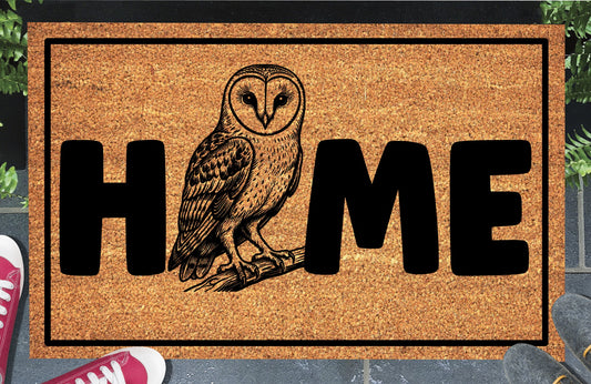 Barn Owl coir doormat styled at a front door entryway — Barn Owl illustration replaces the letter O in HOME
