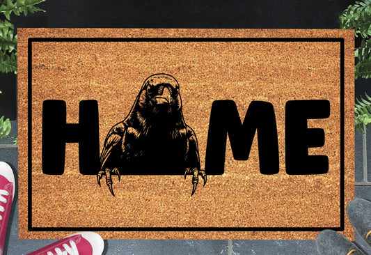 Blackbird doormat #3 with home text placed at front door entryway
