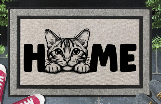 Bengal Cat all-weather doormat #2 featuring a Little Leopard illustration replacing the letter O in HOME, woven polyester, 18x30