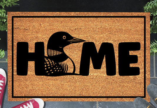 Common Loon Doormat #1 on a front doorway — natural coir welcome mat