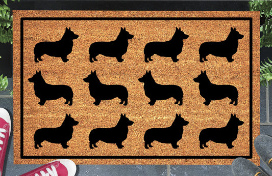 Corgi Parade coir doormat in a doorway setting — rows of Corgi silhouettes in a repeating pattern on a natural coir mat with black border