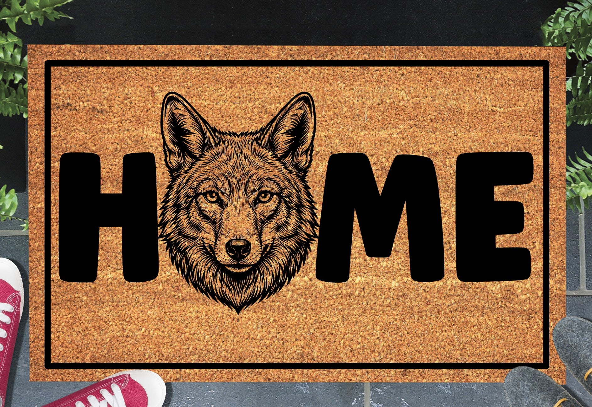 Coyote Doormat #5 shown on a front doorstep — fifth alternate portrait-style coyote illustration with HOME lettering on a natural coir mat with black border