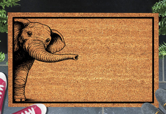 Elephant peeking coir doormat with peeping elephant design placed at front door entrance