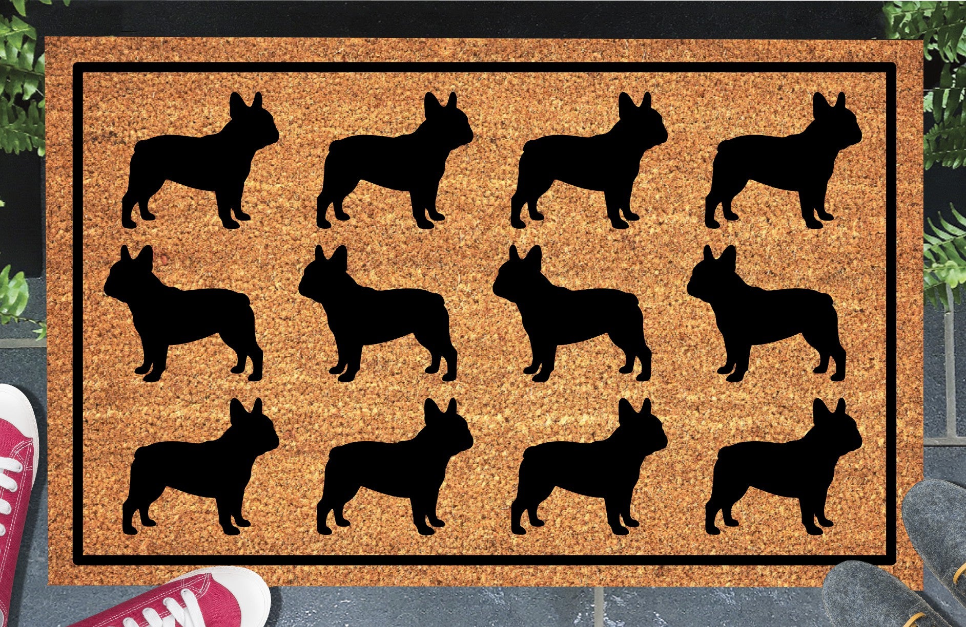 French Bulldog Parade coir doormat in a doorway setting — rows of Frenchie silhouettes in a repeating pattern on a natural coir mat with black border