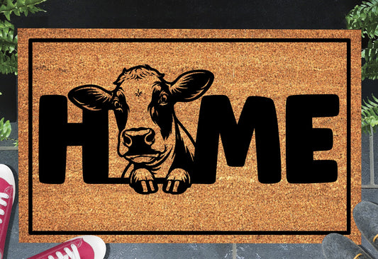 Holstein Cow doormat #1 with cow peering through HOME lettering on natural coir