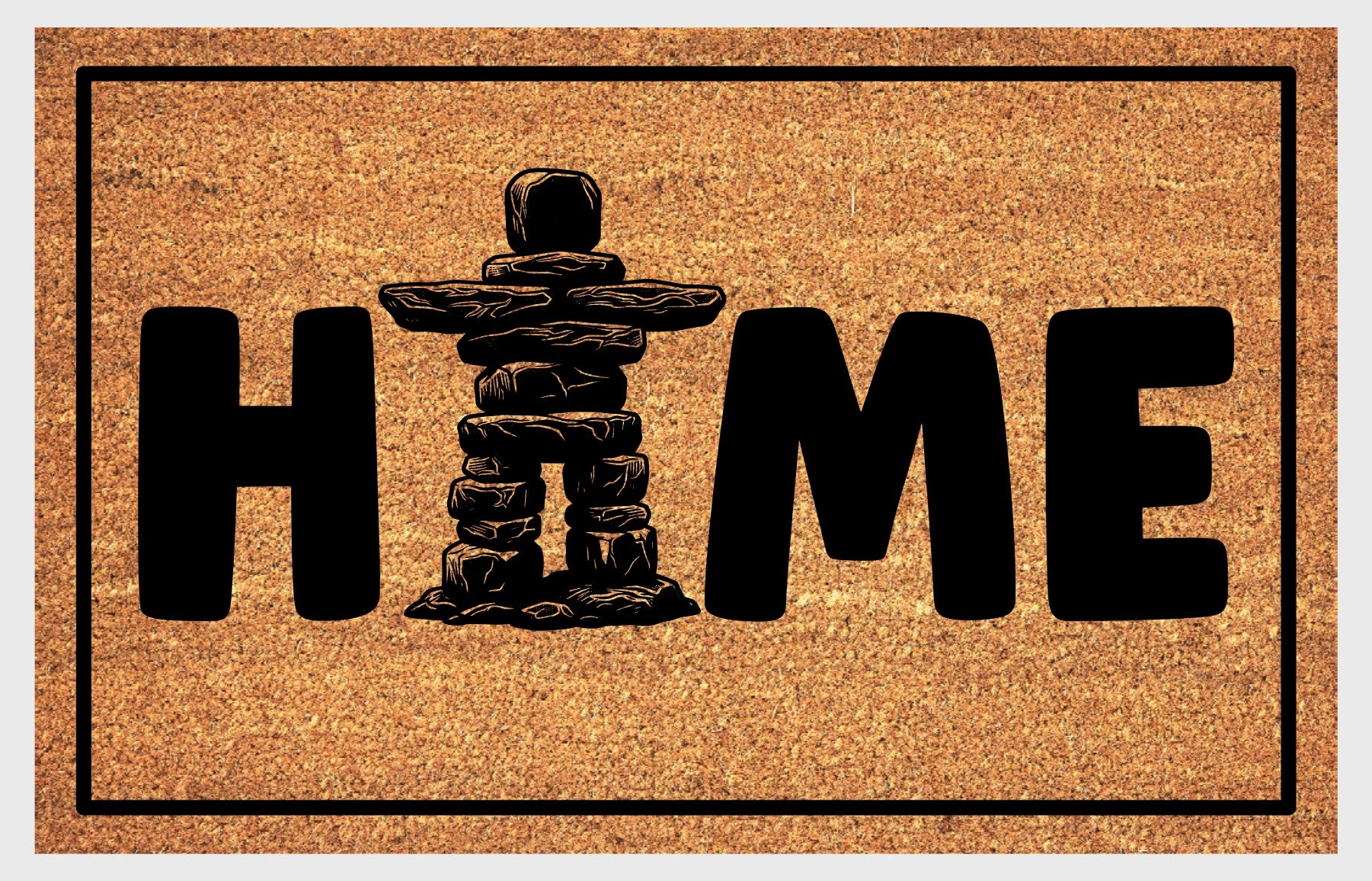 Inukshuk Doormat #1 — natural coir welcome mat with Inukshuk design