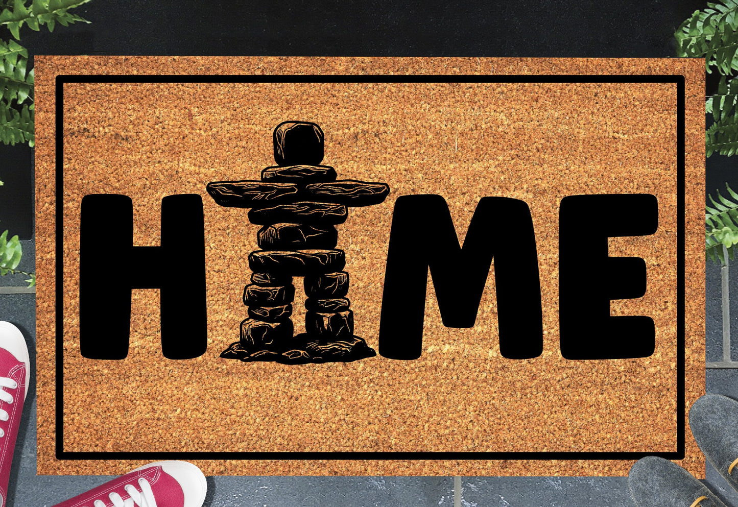Inukshuk Doormat #1 on a front doorway — natural coir Canada welcome mat