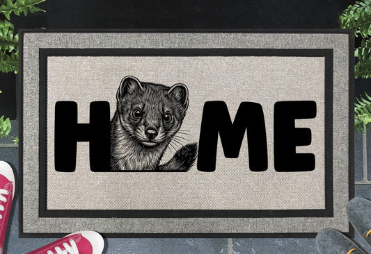 Irish Stoat doormat shown at front door, Irish Stoat portrait illustration with HOME lettering on grey woven polyester mat