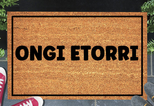 Ongi Etorri Basque welcome mat in doorway