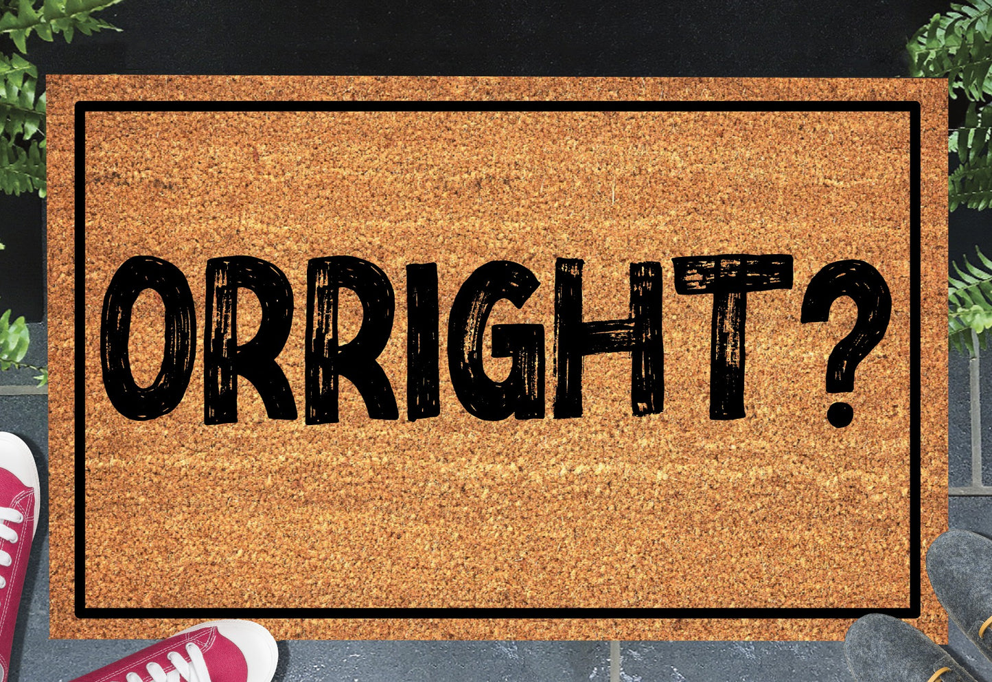 Orright? natural coir doormat with bold British greeting design displayed at a front door entryway — available in 16x24, 18x30, and 24x36 inches
