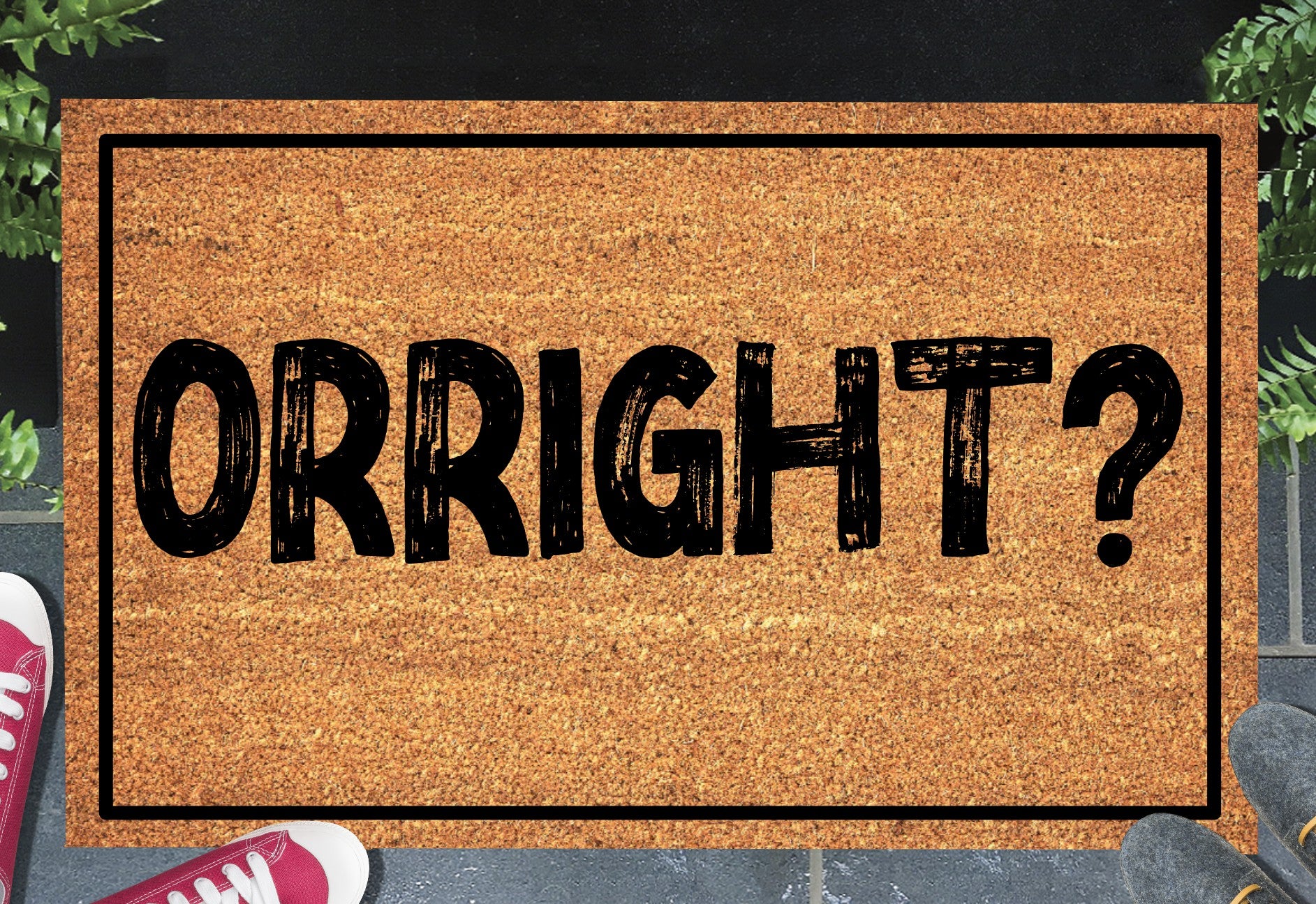 Orright? natural coir doormat with bold British greeting design displayed at a front door entryway — available in 16x24, 18x30, and 24x36 inches