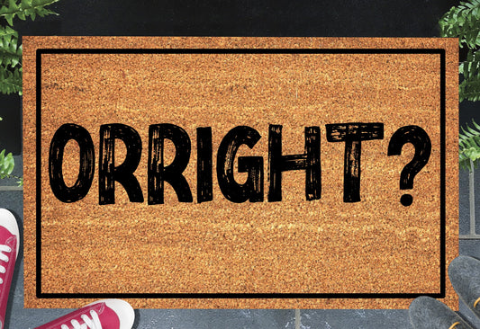 Orright? natural coir doormat with bold British greeting design displayed at a front door entryway — available in 16x24, 18x30, and 24x36 inches