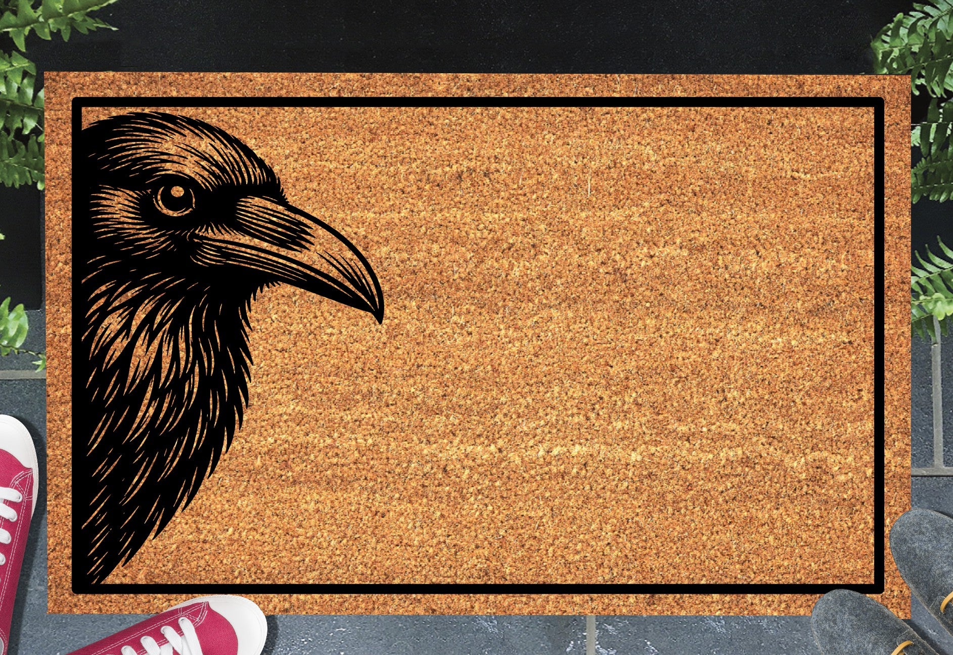 Raven head portrait peeking from the edge of a natural coir doormat on a front porch entryway
