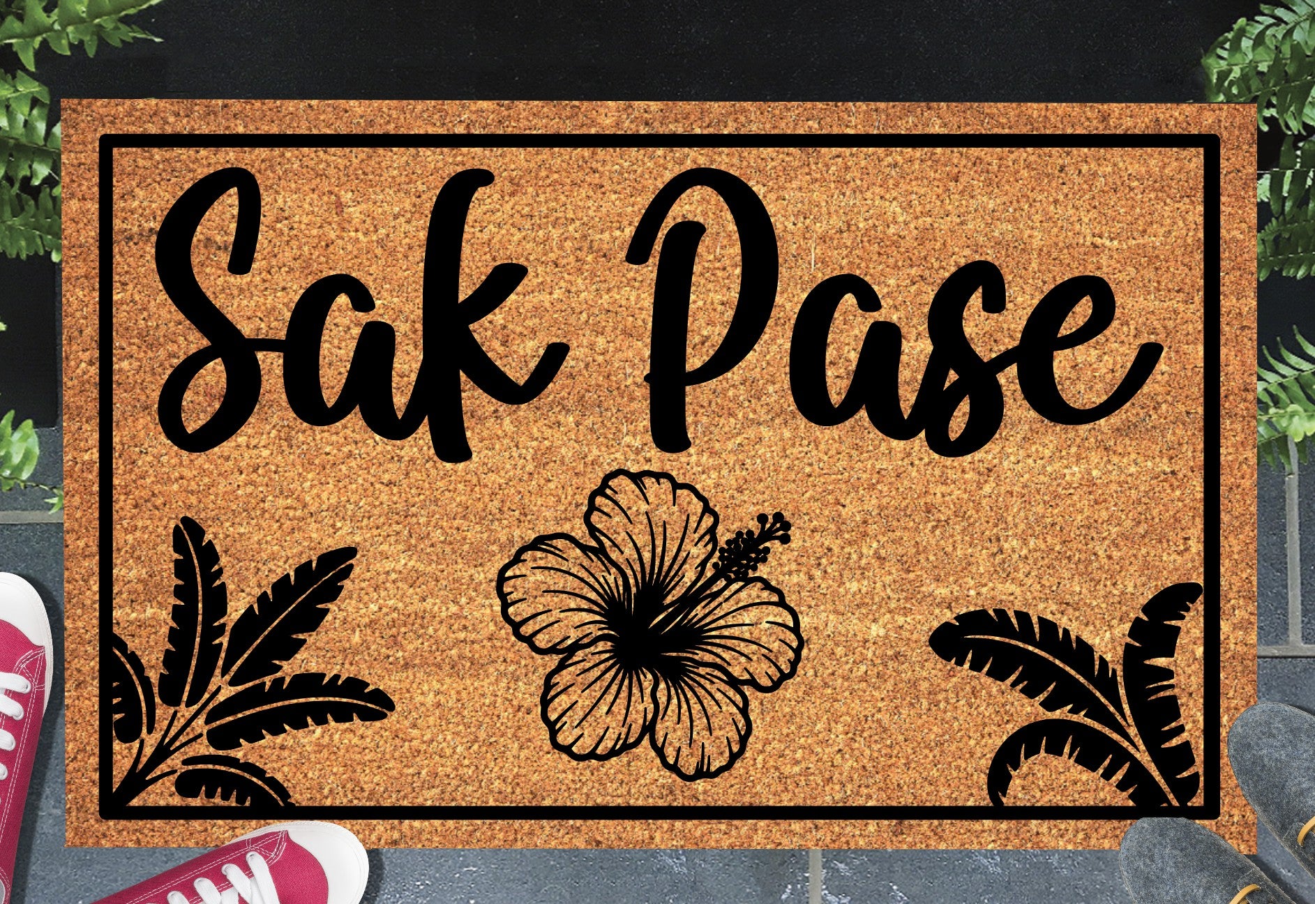 Sak Pase Haitian Creole doormat in a doorway setting — natural coir welcome mat
