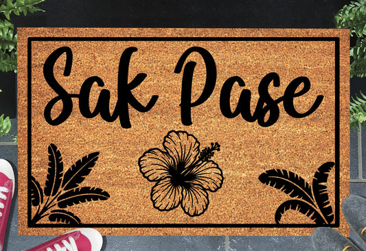 Sak Pase Haitian Creole doormat in a doorway setting — natural coir welcome mat