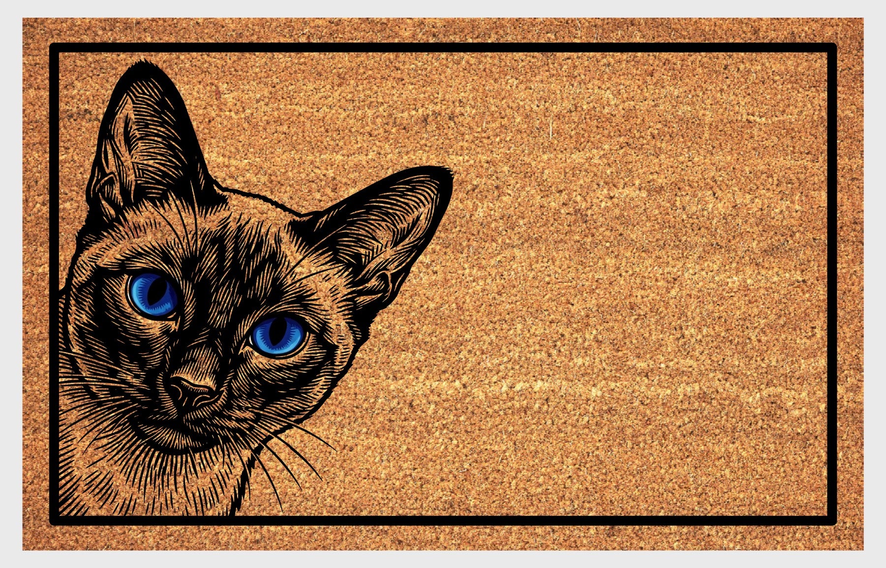 Yowler peeping from the left edge with piercing blue eyes and seal point coat on a natural coir mat with black border
