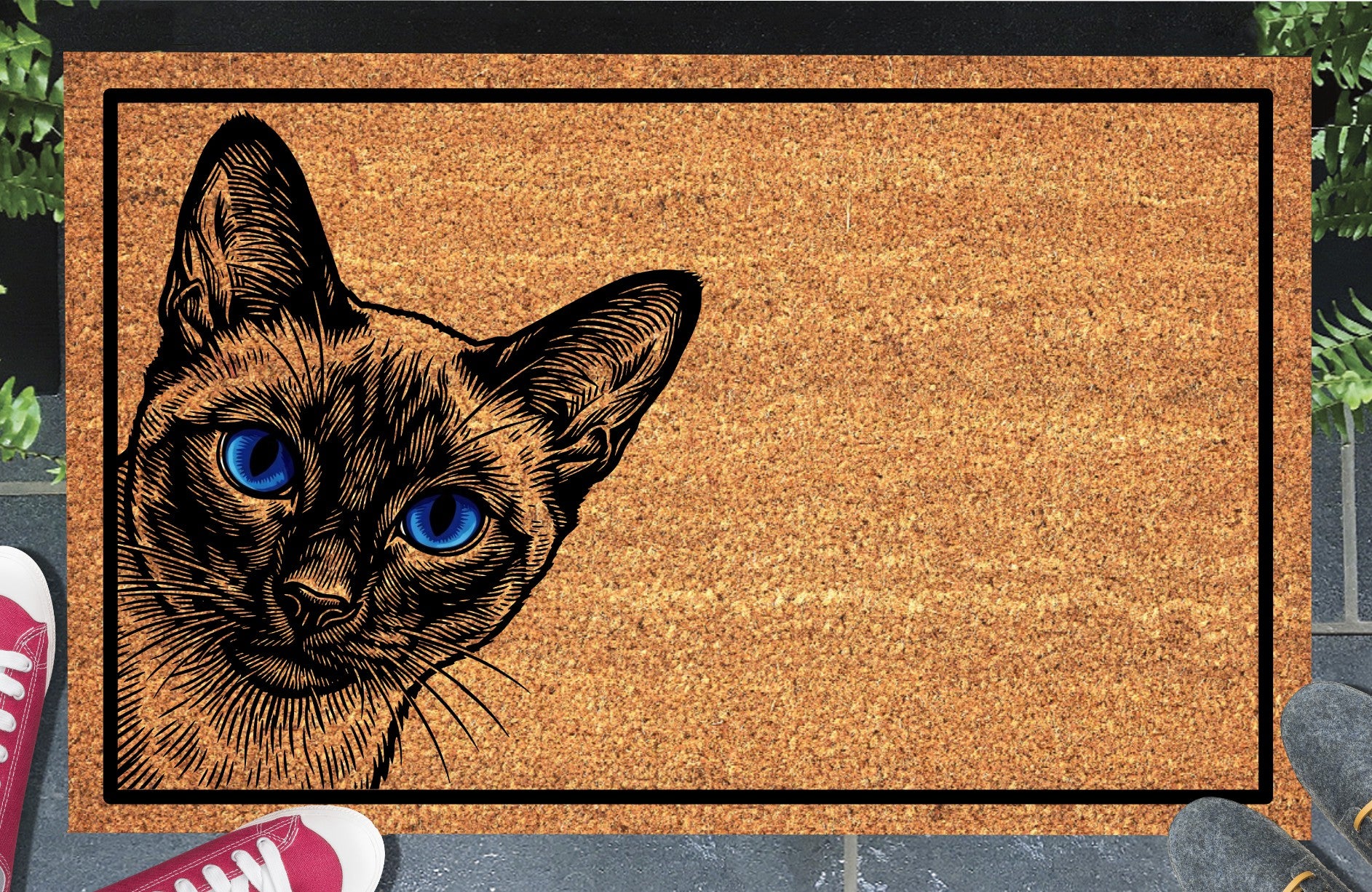 Siamese cat peeking doormat #2 in a doorway setting — Yowler peeping from the left edge with piercing blue eyes and seal point coat on a natural coir mat with black border