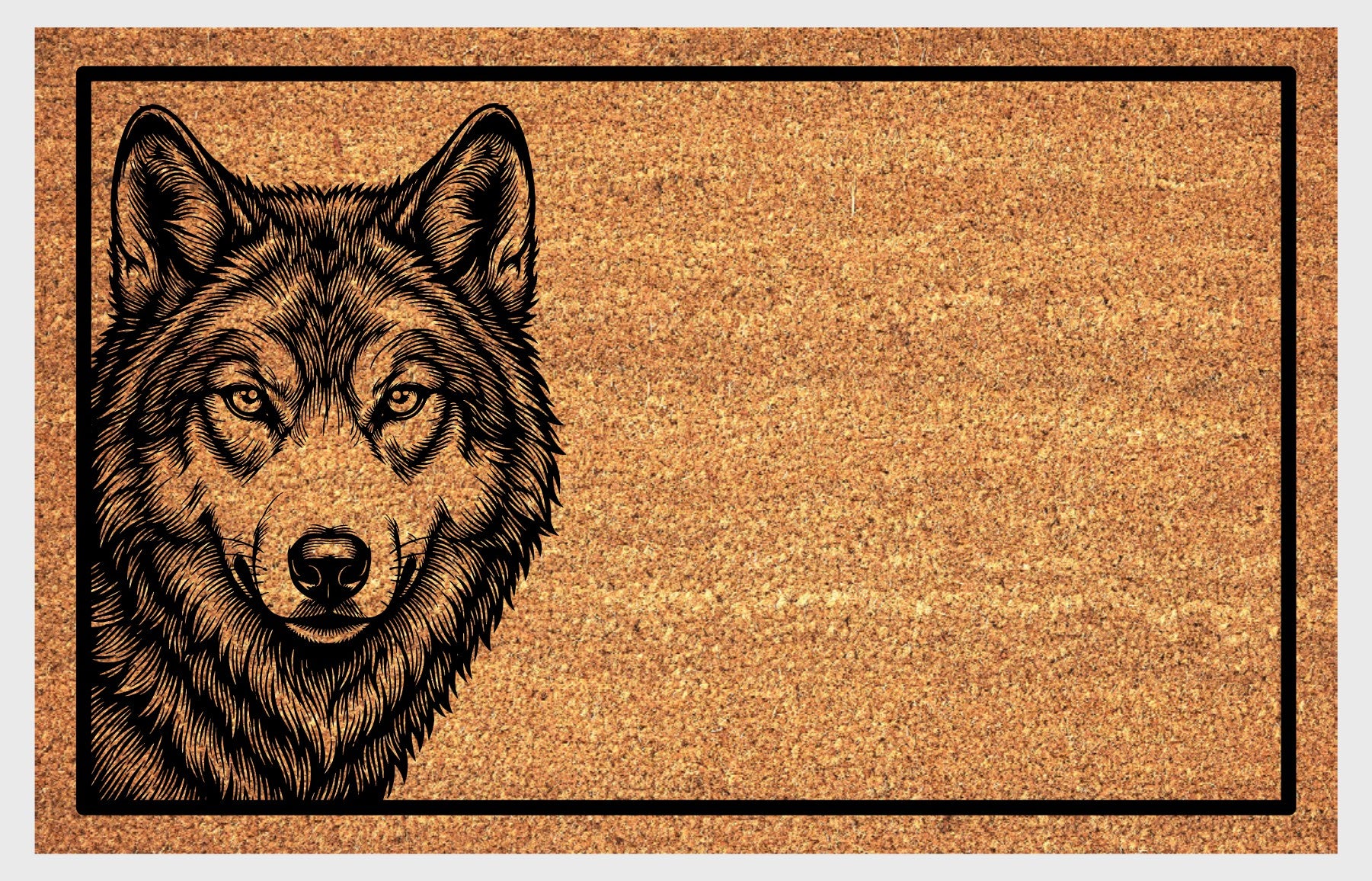 Wolf Doormat #1 product flat lay — etched-style wolf face peering from the left side on natural coir with black border