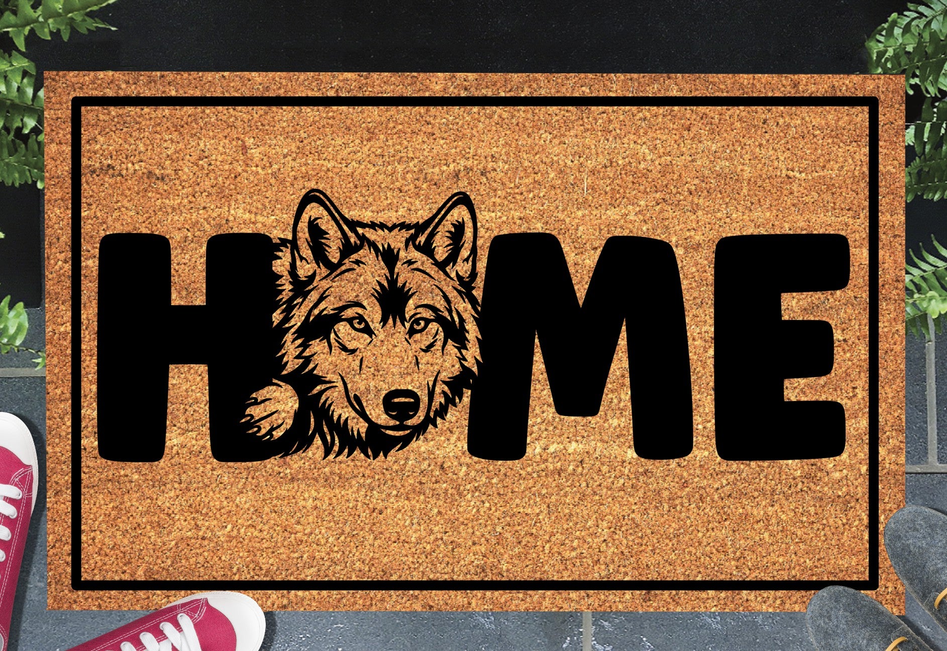 Wolf Doormat #4 shown on a front doorstep — fourth alternate portrait-style wolf illustration with HOME lettering on a natural coir mat with black border