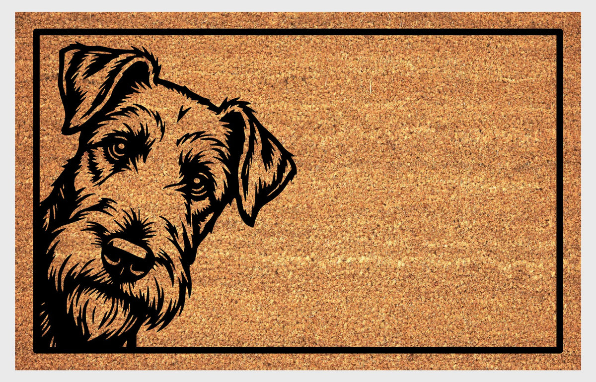 Airedale Terrier Peeking Doormat #1 with a bearded Airedale illustration peeking from the left edge of a black-bordered natural coir mat, flat front view