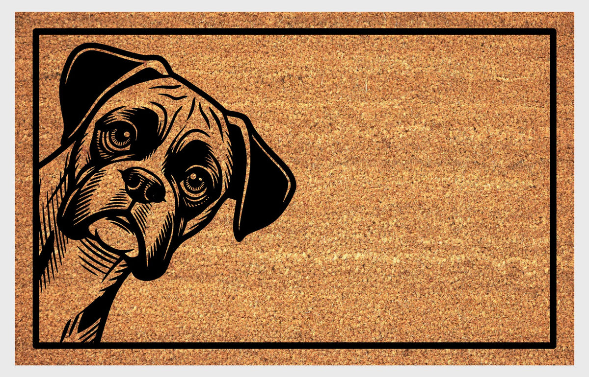 Boxer Dog peeking coir doormat — close-up of Boxer peeking from the side of the mat on natural coir