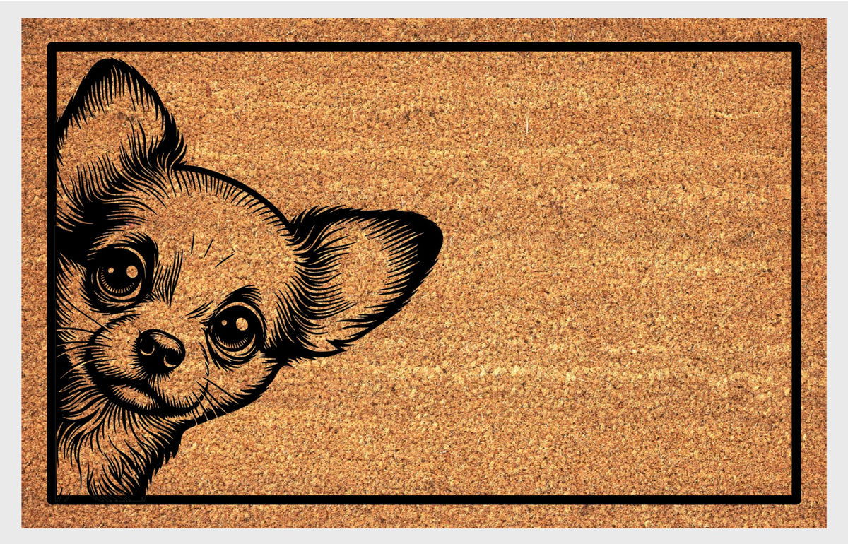 Chihuahua peeking coir doormat — close-up of Chihuahua peeking up from the bottom edge of the mat on natural coir